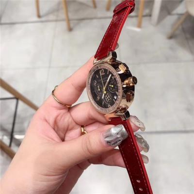 Replica Tambour Moon Japan Quartz Chronograph Movement Womens Watch Black Dial Leather Strap F03