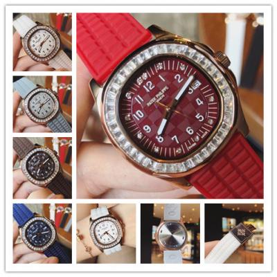 Replica Nautilus Japan Quartz Movement Womens Watch Red Dial Diamonds Case Rubber Strap E24