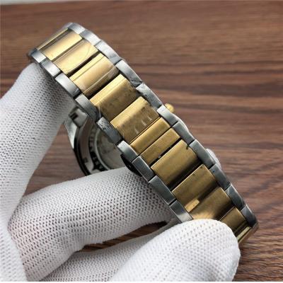 Replica Overseas Japan Miyota 8215 Automatic Movement Mens Watch Gold Dial Two Tone Yellow Gold E154