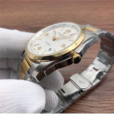 Replica Overseas Japan Miyota 8215 Automatic Movement Mens Watch Gold Dial Two Tone Yellow Gold E154